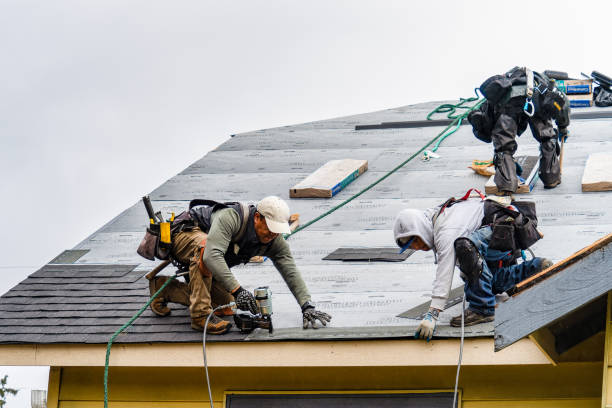 Professional Gutter Installation technician working in Vina, CA